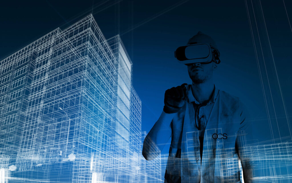 A man wearing a VR headset stands in front of a modern building, showcasing advancements in OCS technology.