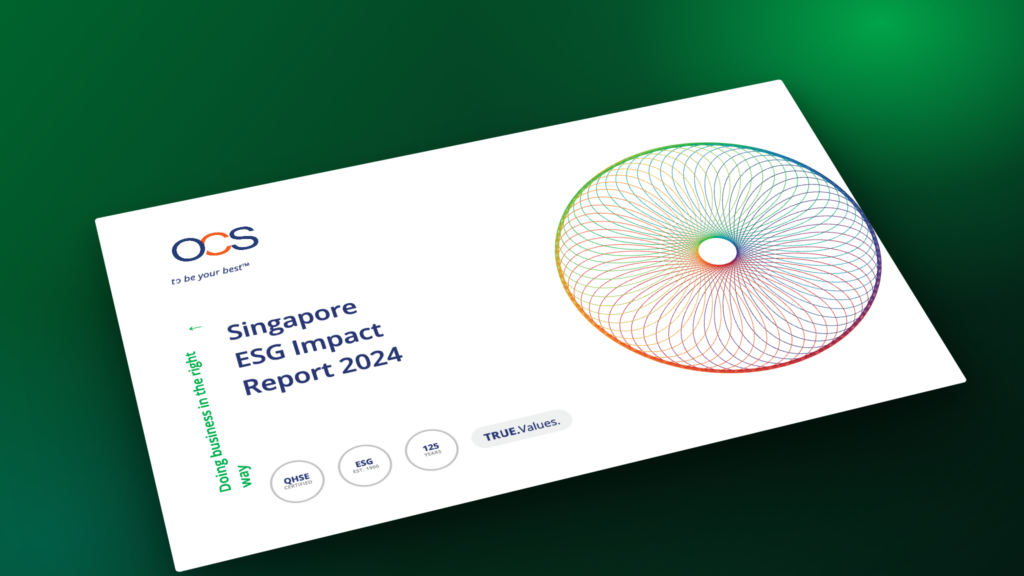 A report cover titled Singapore ESG Impact Report 2024 with a colorful geometric spiral design and the OCS logo on a white background, set against a green gradient surface.